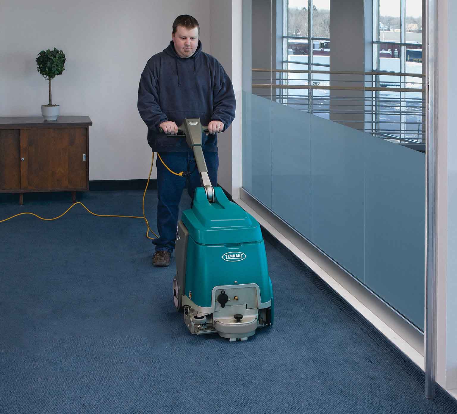 R3 Walk-Behind Extractor cleaning a carpeted floor R3 Walk-Behind Extractor cleaning a carpeted floor