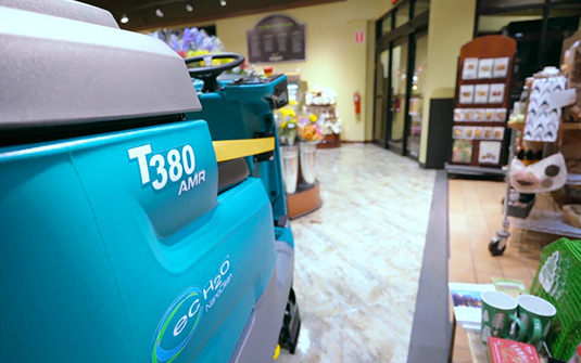 tennant t380 robotic floor scrubber cleaning around items in grocery store tennant t380 robotic floor scrubber cleaning around items in grocery store