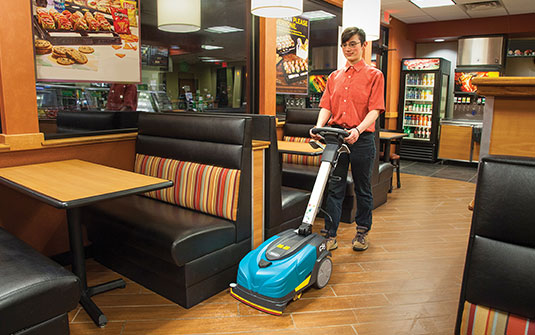 cleaning staff using CS5 walk behind floor scrubber in convenience store to clean floor cleaning staff using CS5 walk behind floor scrubber in convenience store to clean floor